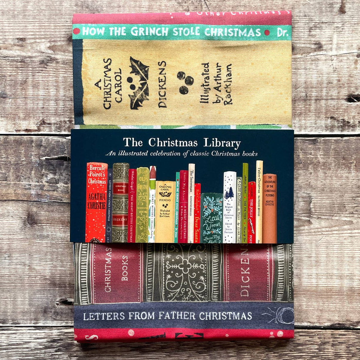 The Christmas Library - tea towel BookGeek