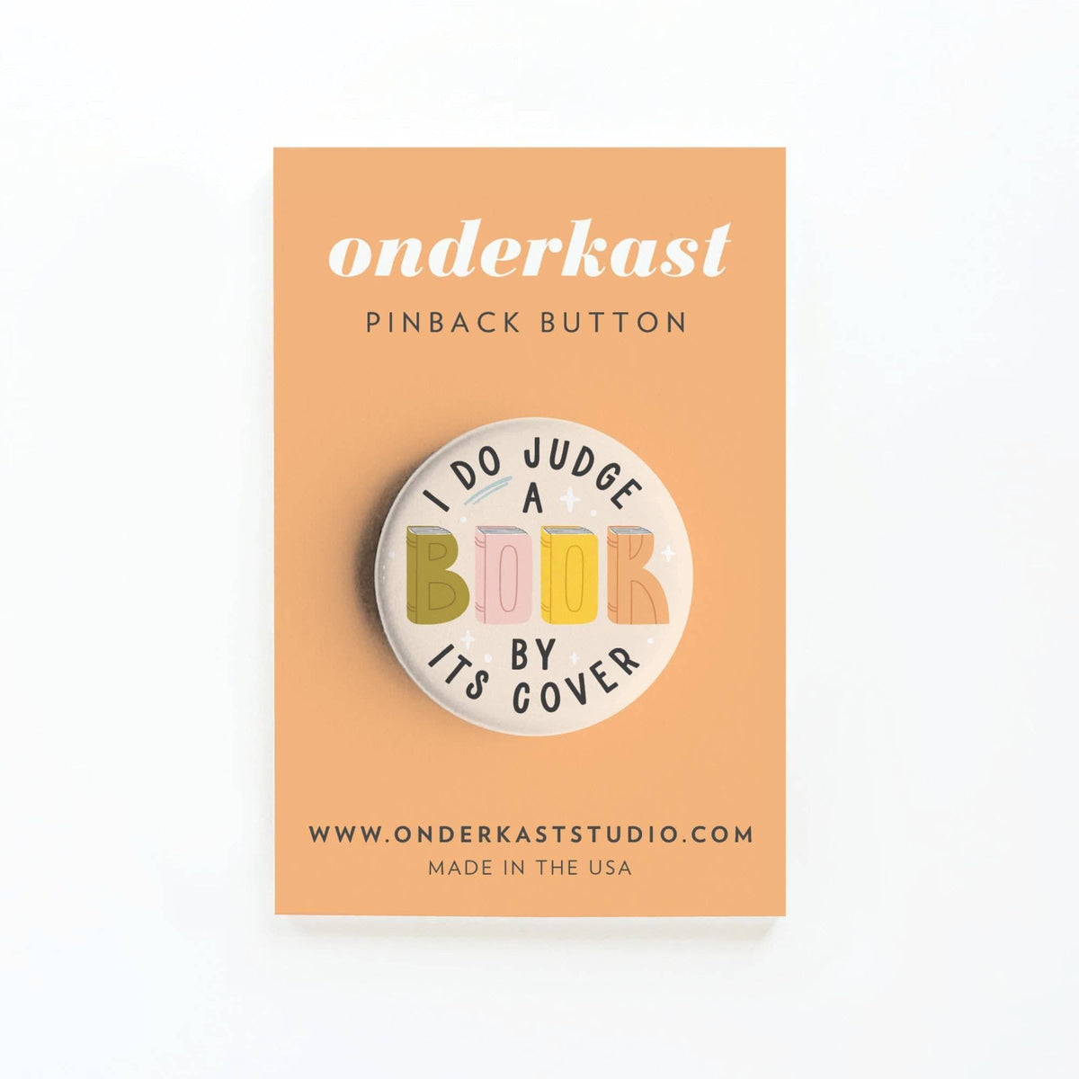 Packaged I DO Judge a Book By Its Cover Pinback Button BookGeek