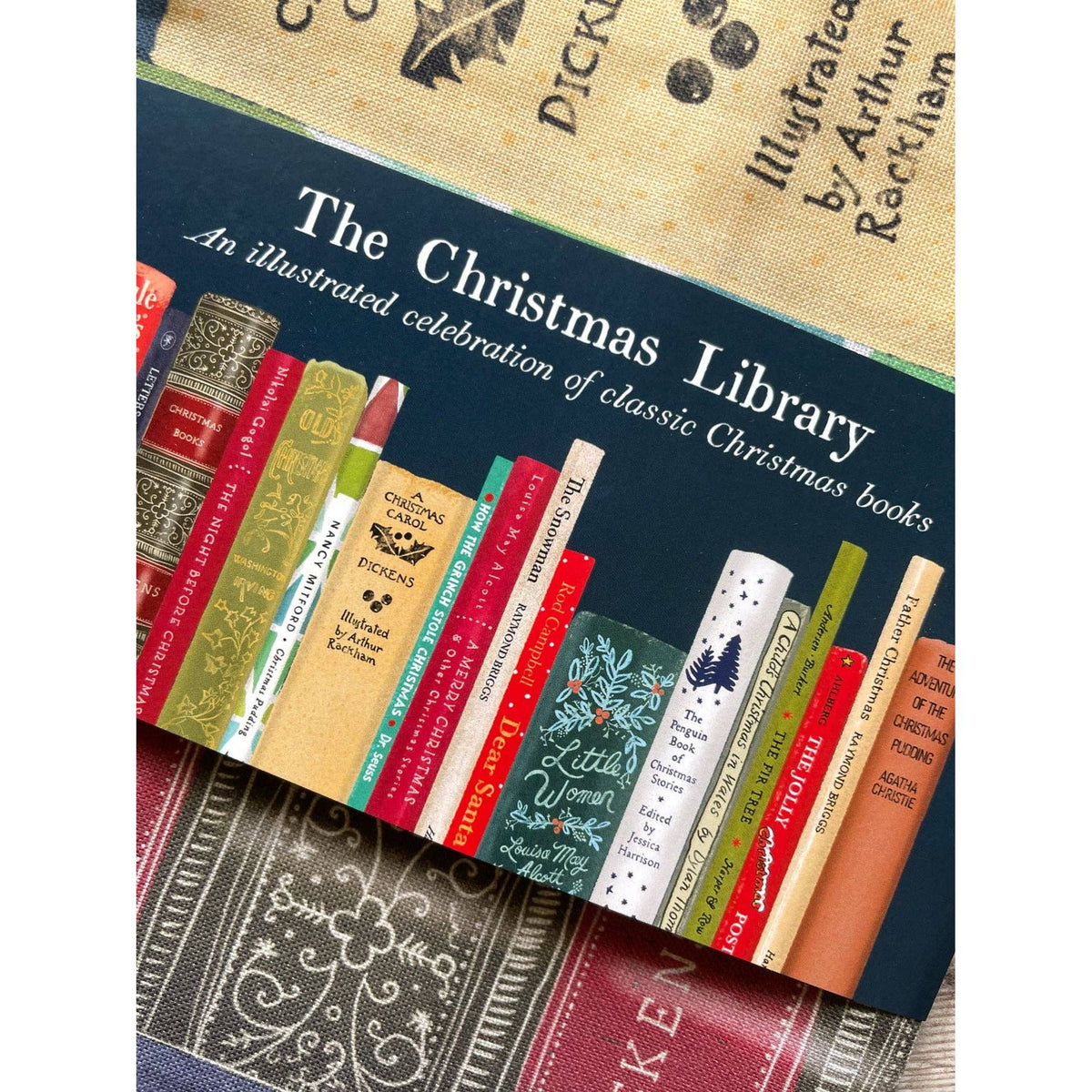 The Christmas Library - tea towel BookGeek