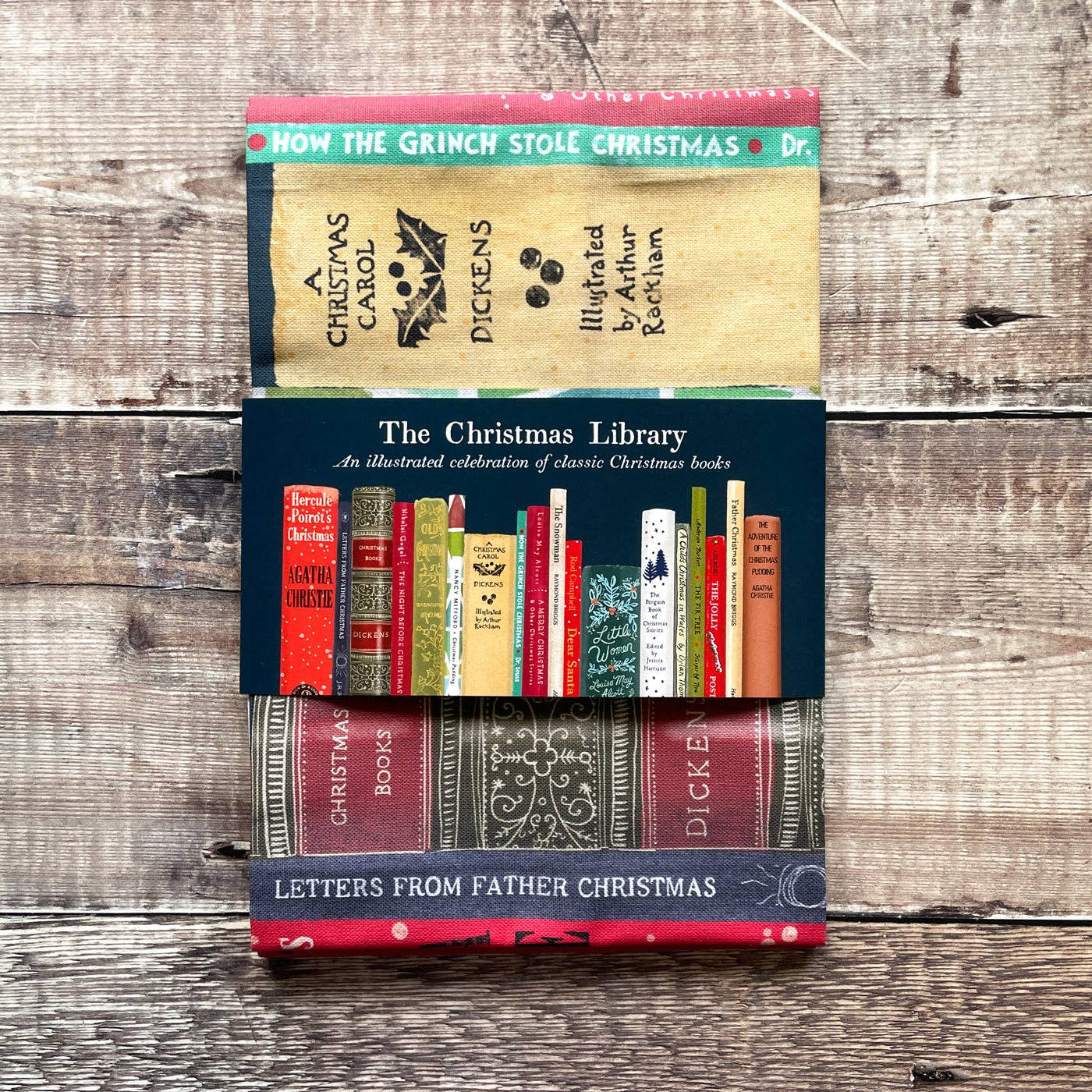 The Christmas Library - tea towel BookGeek